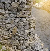 Professional riprap installation services using heavy rock armor